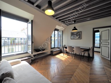 Paris 1er - À deux pas du Jardin du Palais-Royal  
Immeuble standing PDT ravalé - 5ème étage avec ascenseur
Charmant 3 pièces d’angle - 6 balcons - Vues ciel
Grand séjour - 2 chambres en suite - Distribution optimale  - Photo 1